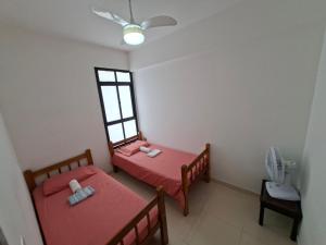 En eller flere senge i et værelse på Apto na Praia de Atalaia a 100 metros da Passarela do Caranguejo + 26 billeder