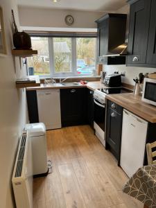 Køkken eller tekøkken på Red Squirrel Cottage