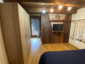 En eller flere senge i et værelse på Rainbow Casa vacanze