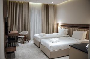 Postel nebo postele na pokoji v ubytování AD Bellagio + 77 fotografií