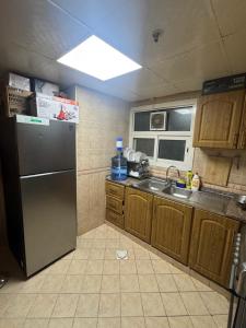 Køkken eller tekøkken på 1BHK Fully Furnished Apartment