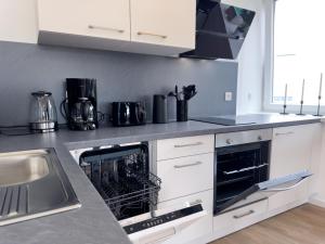 Nhà bếp/bếp nhỏ tại Schöne zentrale Ferienwohnung mit Parkplatz +3 ảnh