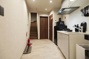 Køkken eller tekøkken på 朱鷺ノ清102