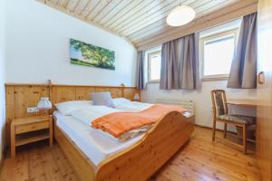 Postel nebo postele na pokoji v ubytování Apartmenthaus Pernull