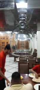 een groep mensen die aan een tafel in een restaurant zitten bij Skylark in Dargai