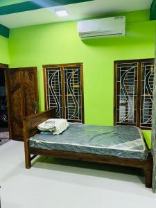 Ένα ή περισσότερα κρεβάτια σε δωμάτιο στο Shan guest rooms