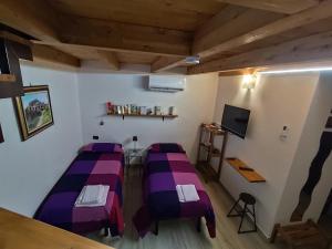 Postel nebo postele na pokoji v ubytování BeB Silvia