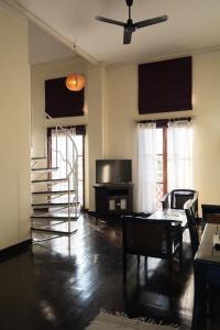 TV a/nebo společenská místnost v ubytování Hotel Khamvongsa