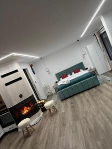 Giường trong phòng chung tại Cuibul lui Răzvan - Domeniul Barabuc Colibița +29 ảnh