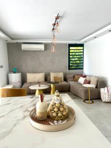 Et opholdsområde på Appartement de standing avec piscine et accès plage - Le Gosier