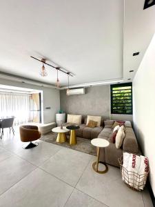 Et opholdsområde på Appartement de standing avec piscine et accès plage - Le Gosier