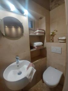 Et badeværelse på Extraordinaire face aux Arènes