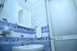 Et badeværelse på Homeinn guest house