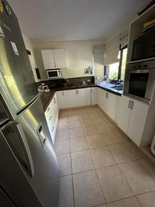 Køkken eller tekøkken på Las Cortaderas House + 3 billeder