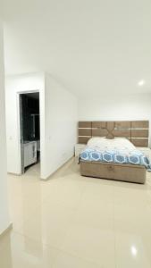 Postel nebo postele na pokoji v ubytování Morabeza Home + 9 fotografií