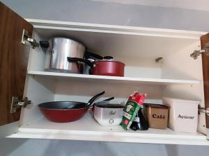 Kuchyň nebo kuchyňský kout v ubytování kit net mobiliada individual com ar condicionado e garagem privada + 3 fotografie