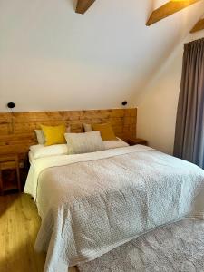 Ένα ή περισσότερα κρεβάτια σε δωμάτιο στο Chata Velebka