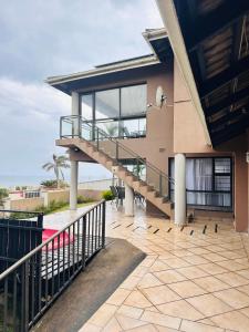 En balkon eller terrasse på Sanlou - Southport