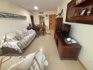 Et tv og/eller underholdning på Apartamento cerca de la playa