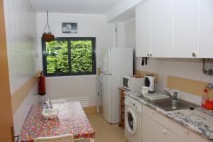 Køkken eller tekøkken på Apartamento Mar e Serra