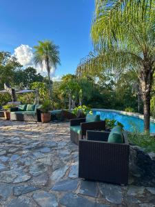 Bazén v ubytování Chalé do Bosque nebo v jeho okolí