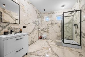 Et badeværelse på Centrum Prime Apartments + 13 billeder