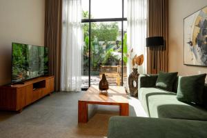 Μια τηλεόραση ή/και κέντρο ψυχαγωγίας στο The Home Villas