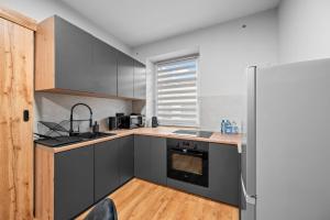 Køkken eller tekøkken på Centrum Prime Apartments