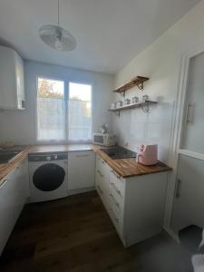 Køkken eller tekøkken på Appartement Troyes + 5 billeder