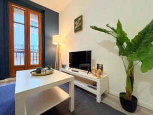 TV a/nebo společenská místnost v ubytování L'Écho du Castella