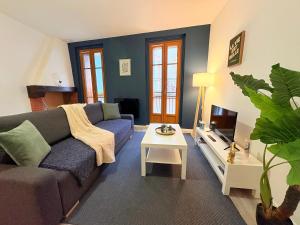 Posezení v ubytování L'Écho du Castella