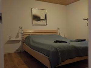 Ένα ή περισσότερα κρεβάτια σε δωμάτιο στο Lyngsasgaard M