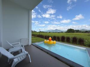 Bazén v ubytování มานอนปัว โฮมสเตย์ น่าน Manornpua Homestay Nan nebo v jeho okolí