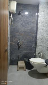 Phòng tắm tại Hotel Bhavya, Ahmedabad