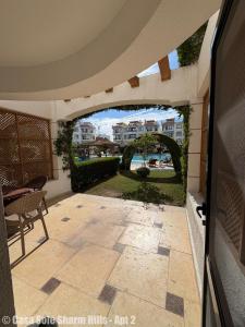 an external view of a patio with an archway at Casa Sole Sharm Hills Apt 2 in Sharm El Sheikh