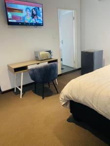 Et tv og/eller underholdning på Linies guest house + 34 billeder