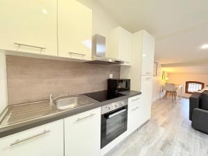 Kuchyň nebo kuchyňský kout v ubytování Le Refuge du Midi + 13 fotografií