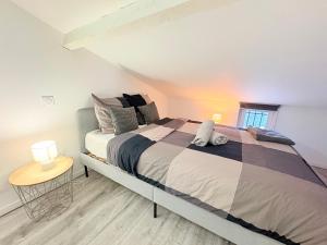 Postel nebo postele na pokoji v ubytování Le Refuge du Midi