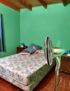 Giường trong phòng chung tại Cosquin