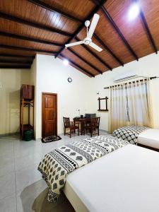 Postel nebo postele na pokoji v ubytování MG Resort - Yala + 43 fotografií