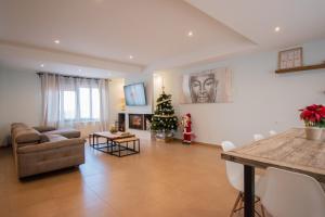 Posezení v ubytování Ronda Home