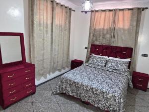 En eller flere senge i et værelse på Villa avec Piscine Meknes + 8 billeder