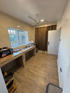 Køkken eller tekøkken på Oforiwaa Heights