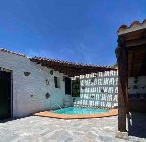 Swimmingpoolen hos eller tæt på Casa Rural el Palmito, privater Pool