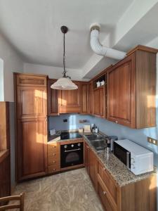 Kuchyň nebo kuchyňský kout v ubytování Ciasa Erna