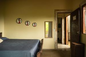 En eller flere senge i et værelse på a casinha