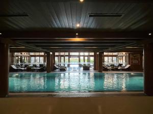 Hồ bơi trong/gần PIRIN GOLF DELUXE PRIVATE STUDIO GABBY ground floor