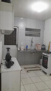 Køkken eller tekøkken på Casa Novo Jardim