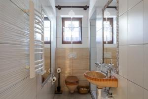 a bathroom with a sink and a toilet at Willa Dukat in Czarny Dunajec +54 photos