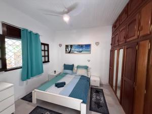 Ένα ή περισσότερα κρεβάτια σε δωμάτιο στο Manou